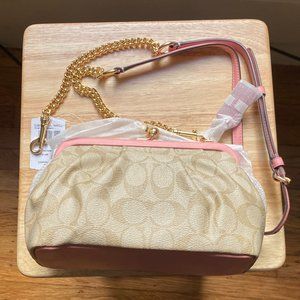 Coach Nora Kisslock Pink Bag in Signature Canvas